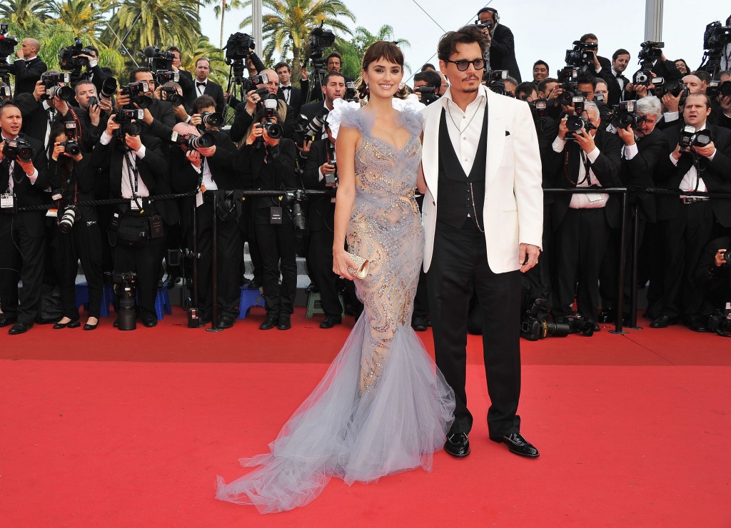 Actor Johnny Depp and actress Penelope Cruz on the red carpet for the "Pirates of the Caribbean: On Stranger Tides" official screening at the Palais des Festivals during the 64th Cannes Film Festival on May 14, 2011 in Cannes, France.