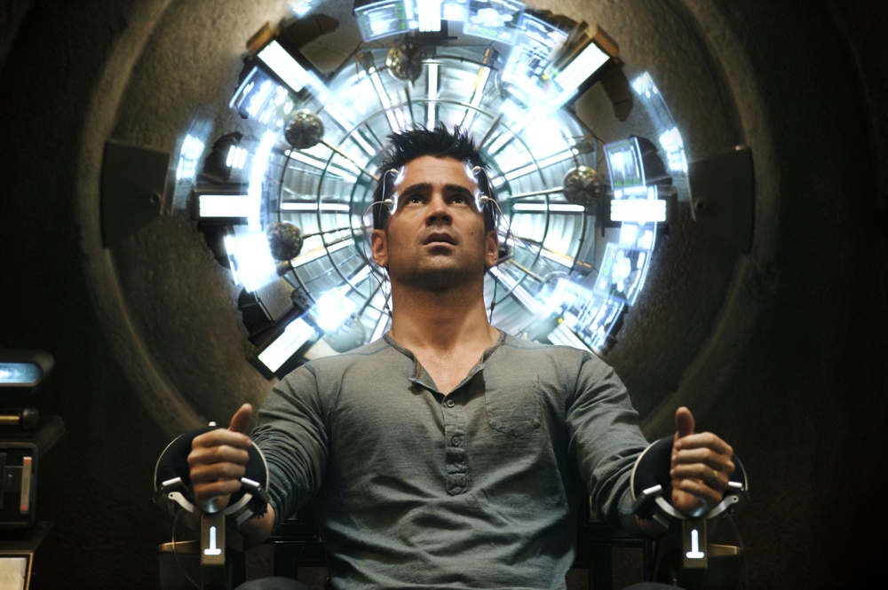 Quaid (Colin Farrell) seated in the Mind Trip Chair inside the Rekall Tripping Den in Columbia Pictures' action thriller TOTAL RECALL.